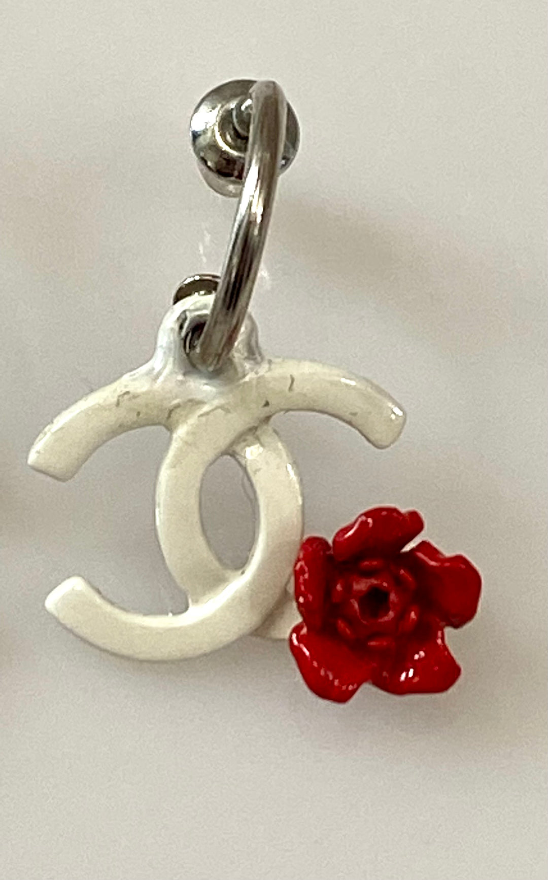 CHANEL SILVER PLATED DANGLE PIERCED EARRINGS