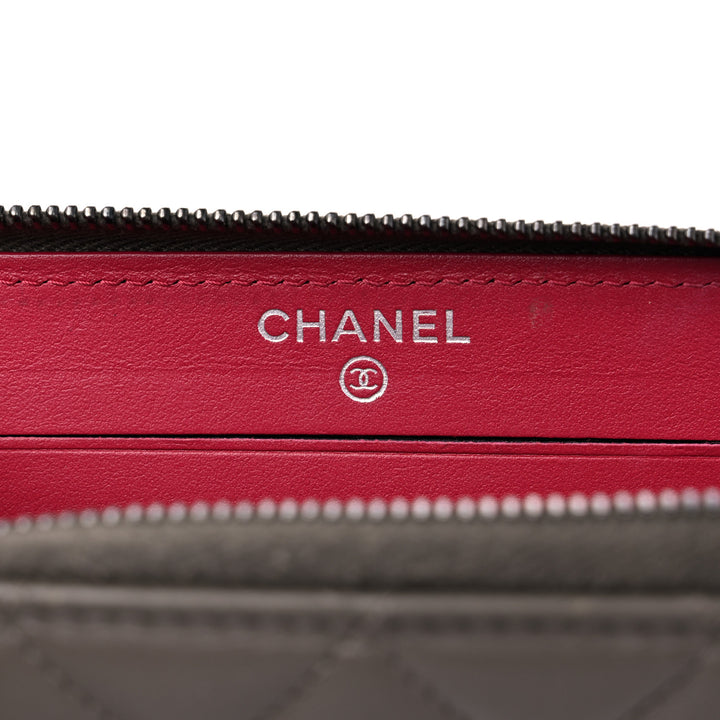 CHANEL QUILTED AGED CALFSKIN SMALL GABRIEL ZIPPY WALLET