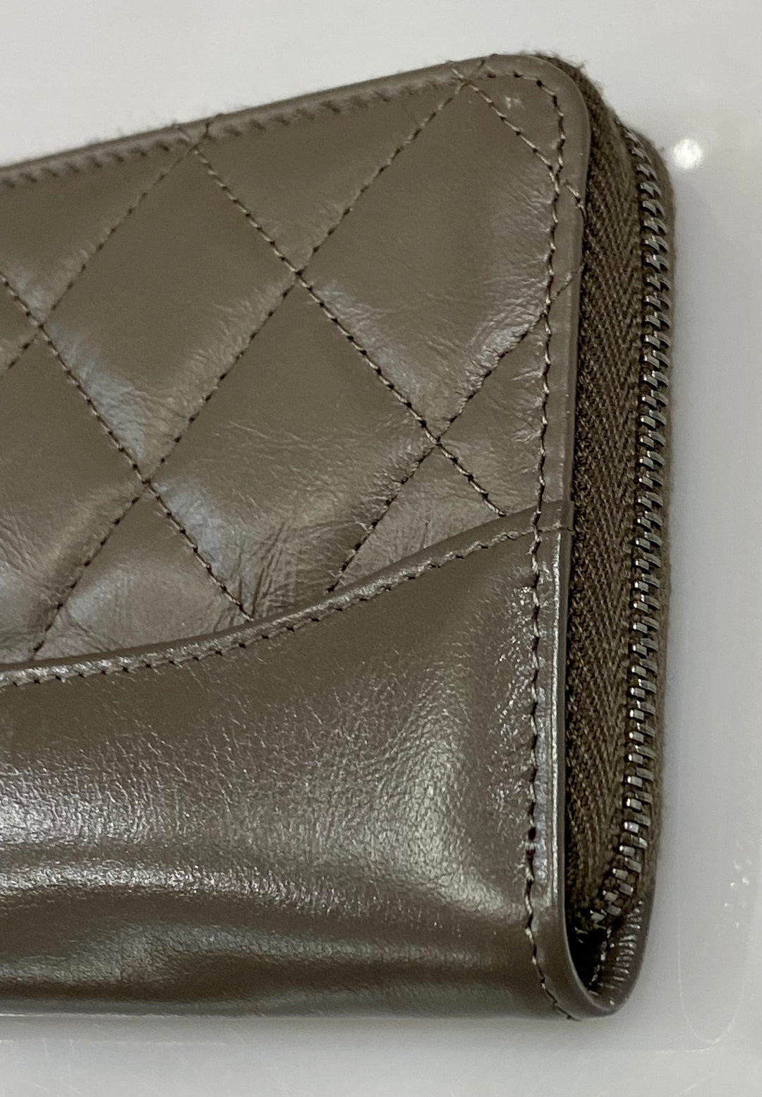 CHANEL QUILTED AGED CALFSKIN SMALL GABRIEL ZIPPY WALLET