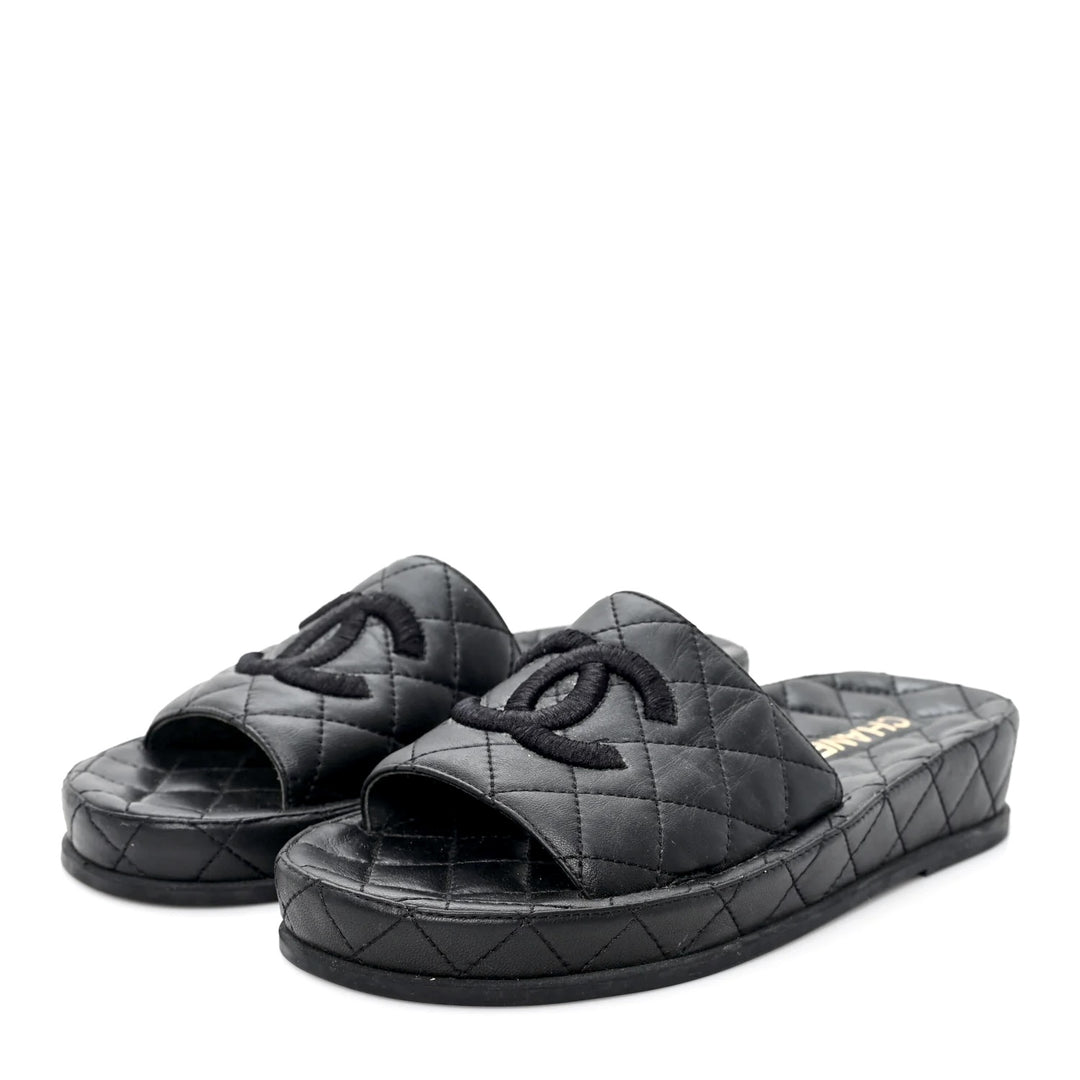 CHANEL QUILTED LAMBSKIN LEATHER CC LOGO MULES