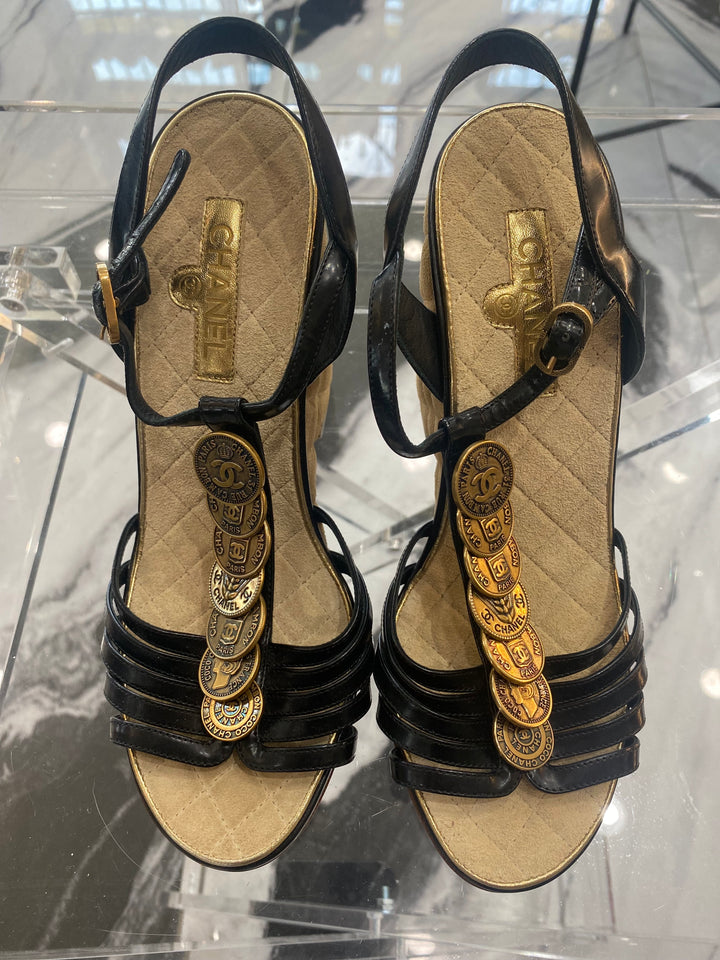 CHANEL MEDALLION QUILTED WEDGE HEEL SANDALS