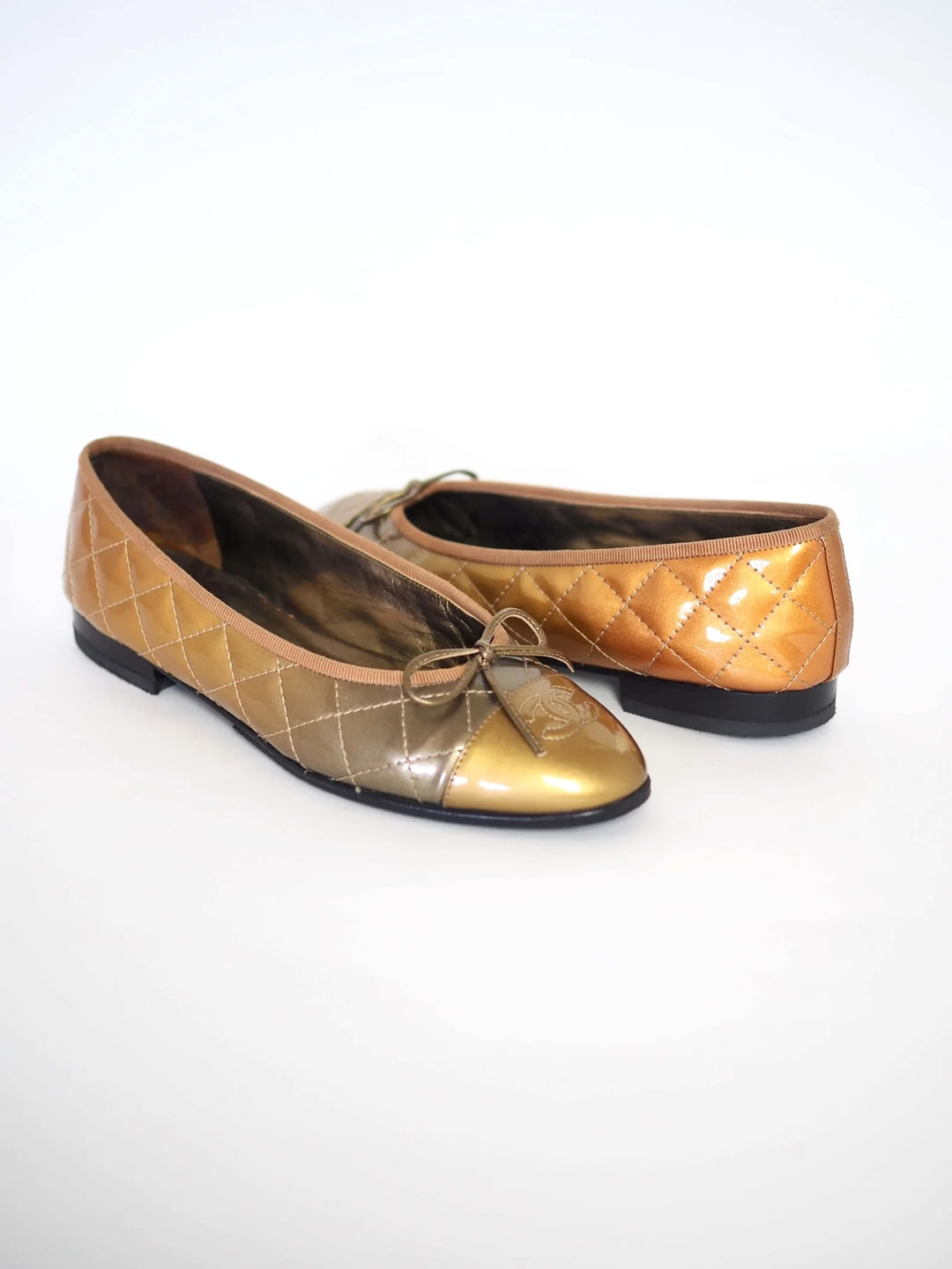 CHANEL GOLD QUILTED CC LOGO BALLET FLATS
