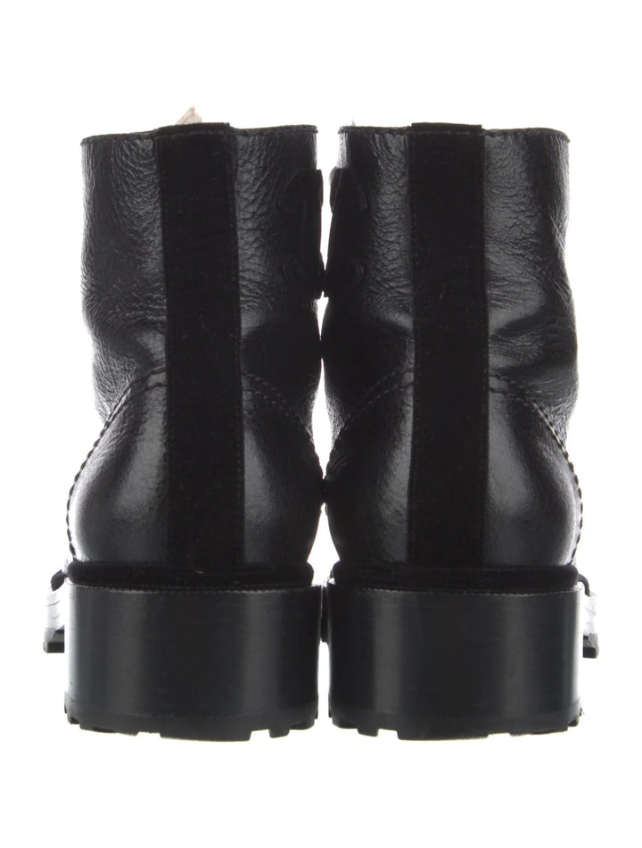 CHANEL SHINY CALFSKIN LEATHER PEARL ACCENT COMBAT BOOTS