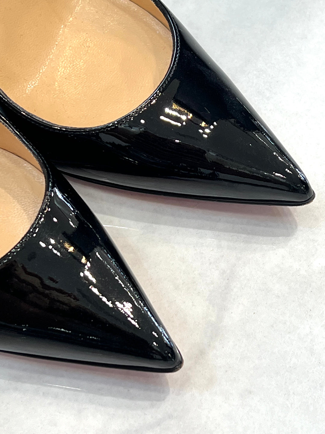 CHRISTIAN LOUBOUTIN DECOLLETE 85 PATENT LEATHER PUMPS