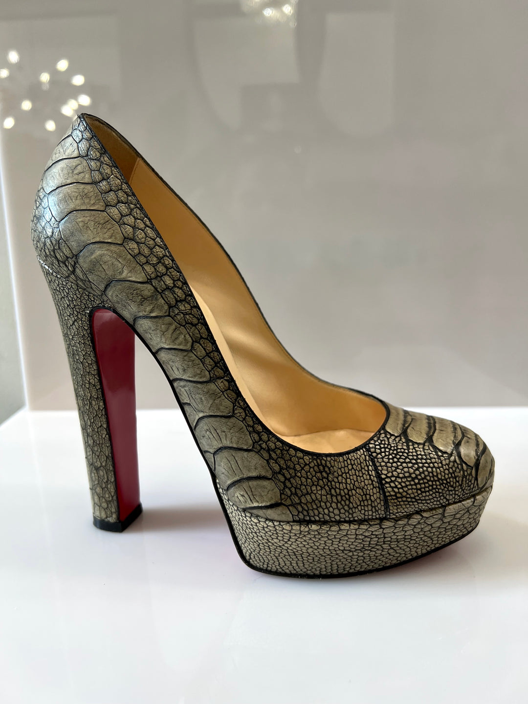 CHRISTIAN LOUBOUTIN OSTRICH LEATHER BIBI PLATFORM PUMPS