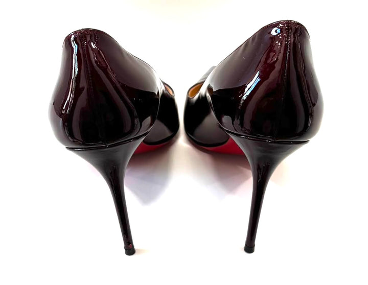 CHRISTIAN LOUBOUTIN PIGALLE 85 PATENT LEATHER PUMPS