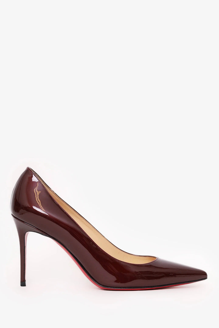 CHRISTIAN LOUBOUTIN PIGALLE 85 PATENT LEATHER PUMPS