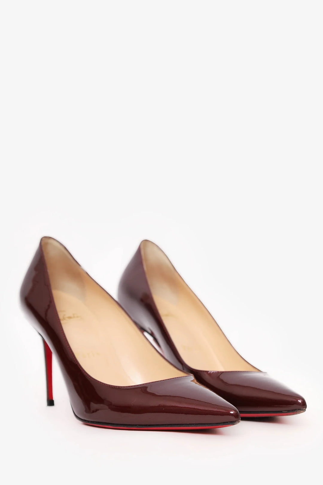 CHRISTIAN LOUBOUTIN PIGALLE 85 PATENT LEATHER PUMPS