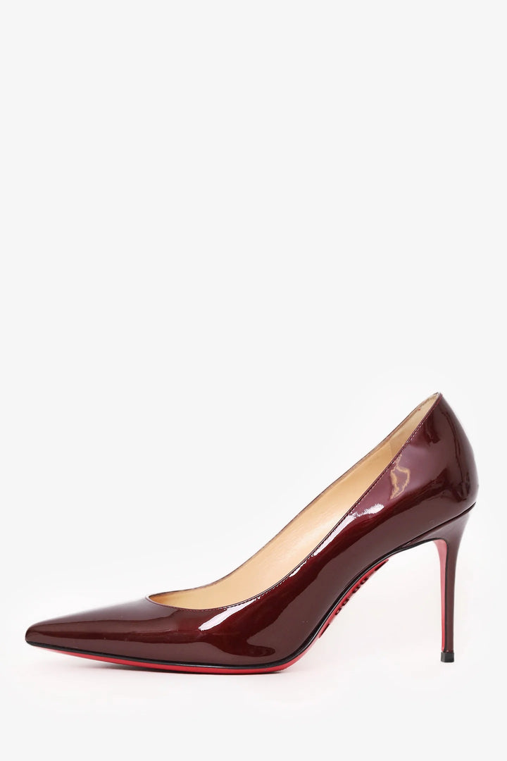 CHRISTIAN LOUBOUTIN PIGALLE 85 PATENT LEATHER PUMPS