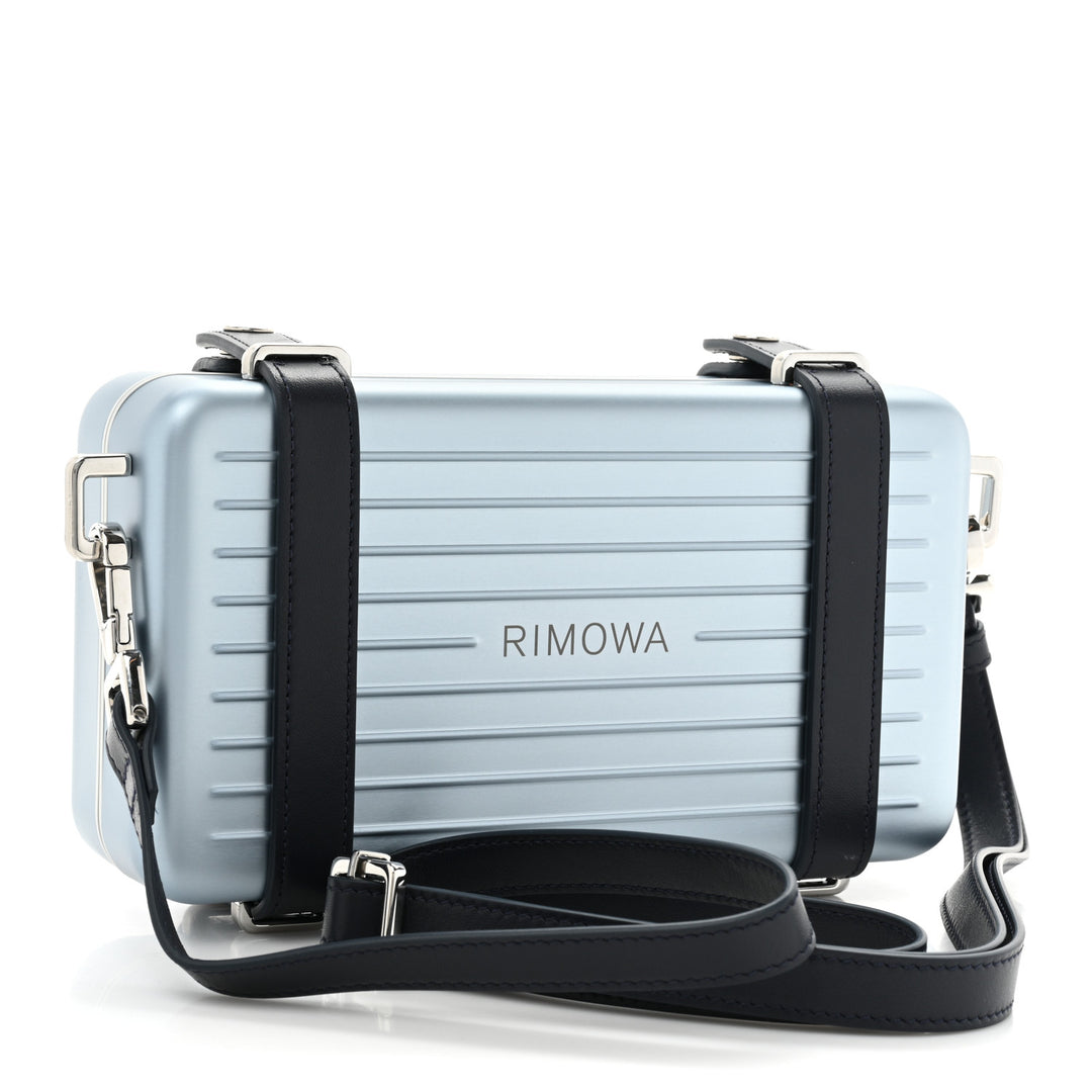 DIOR X RIMOWA ALUMINUM PERSONAL CLUTCH ON STRAP – Caroline's