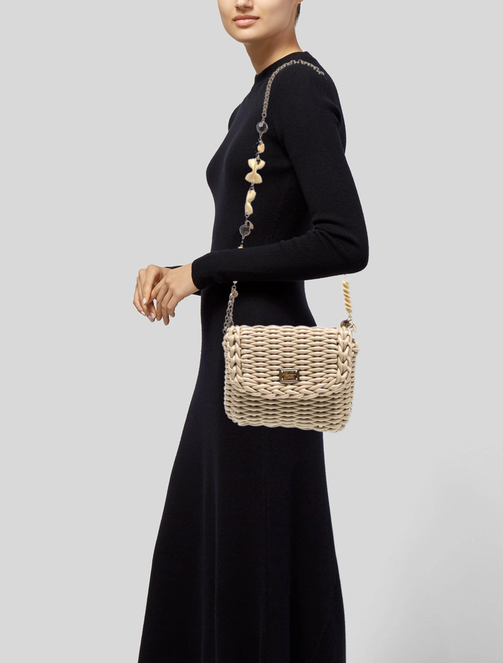 DOLCE &amp; GABBANA PATENT-FINISH WOVEN CHARMS CHAIN CROSSBODY BAG