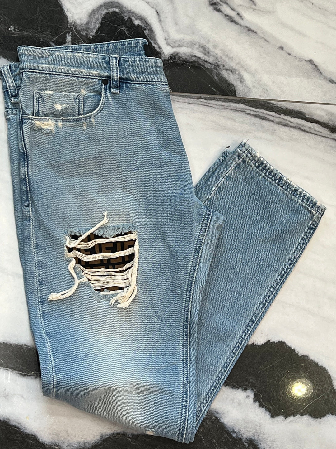 FENDI DISTRESSED FF LOGO JEANS