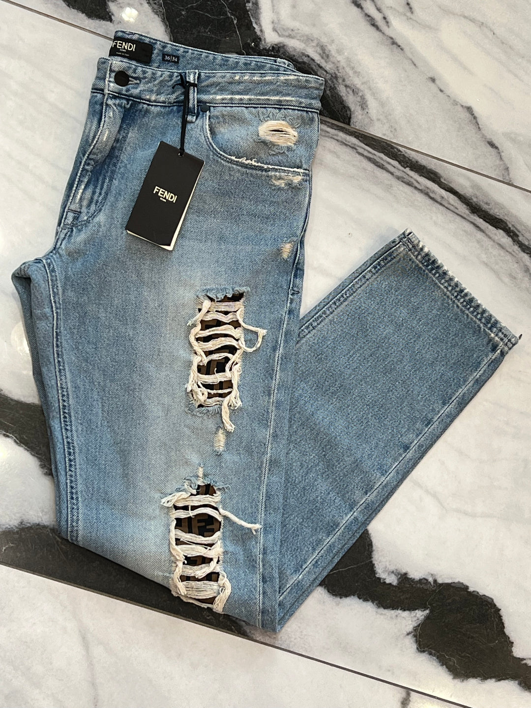 FENDI DISTRESSED FF LOGO JEANS
