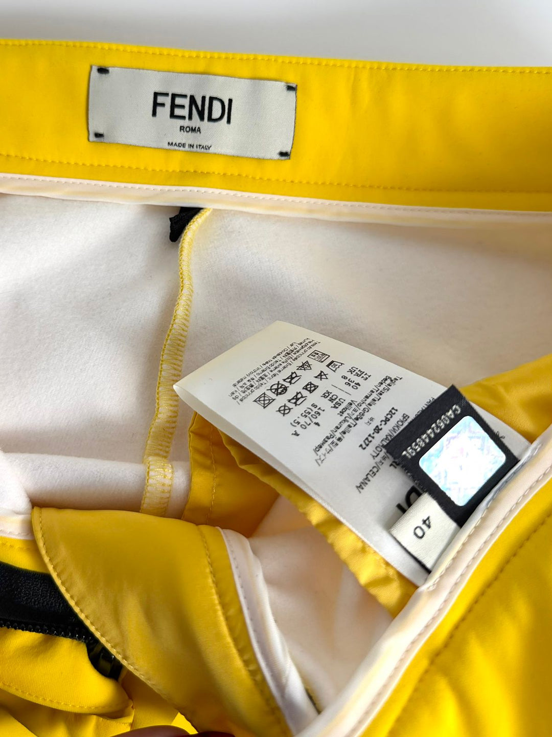 FENDI ICONIC FF SLIM FIT PANTS
