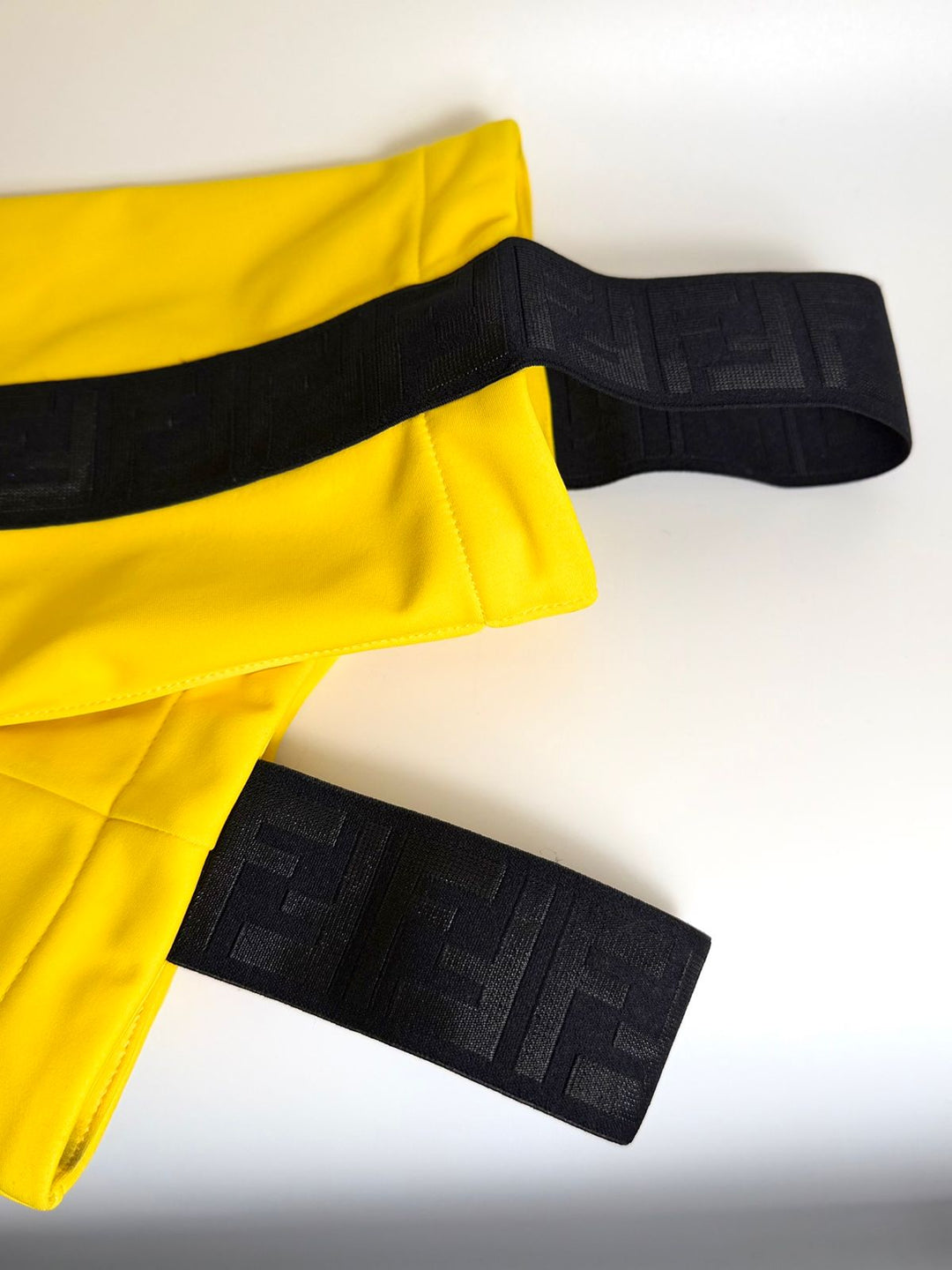 FENDI ICONIC FF SLIM FIT PANTS