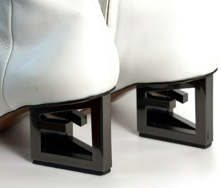 GIVENCHY TRIANGLE HEEL LEATHER BOOTS