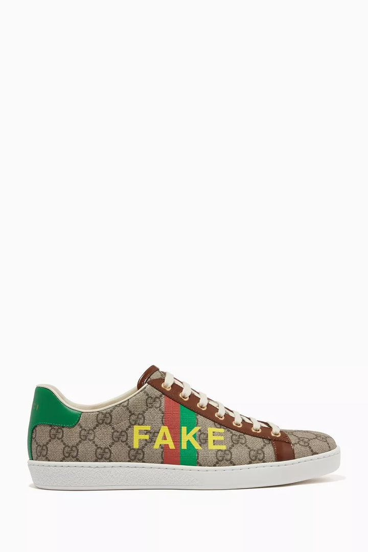 GUCCI ACE GG MONOGRAM FAKE/NOT CANVAS &amp; LEATHER SNEAKERS