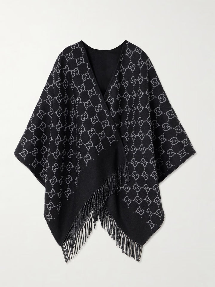 GUCCI GG MONOGRAM WOOL JACQUARD FRINGED CAPE IN BLACK