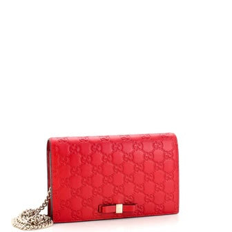 GUCCI GUCCISSIMA LEATHER SIGNATURE BOW WALLET ON CHAIN
