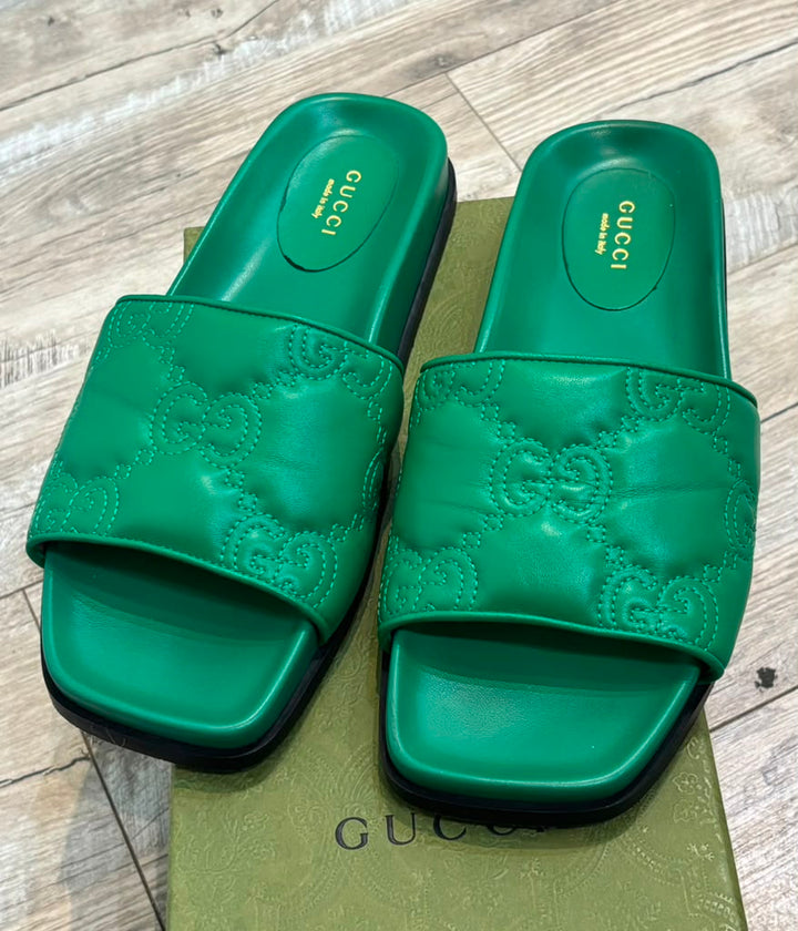 GUCCI GG MATELASSÉ LEATHER SLIDE MULES