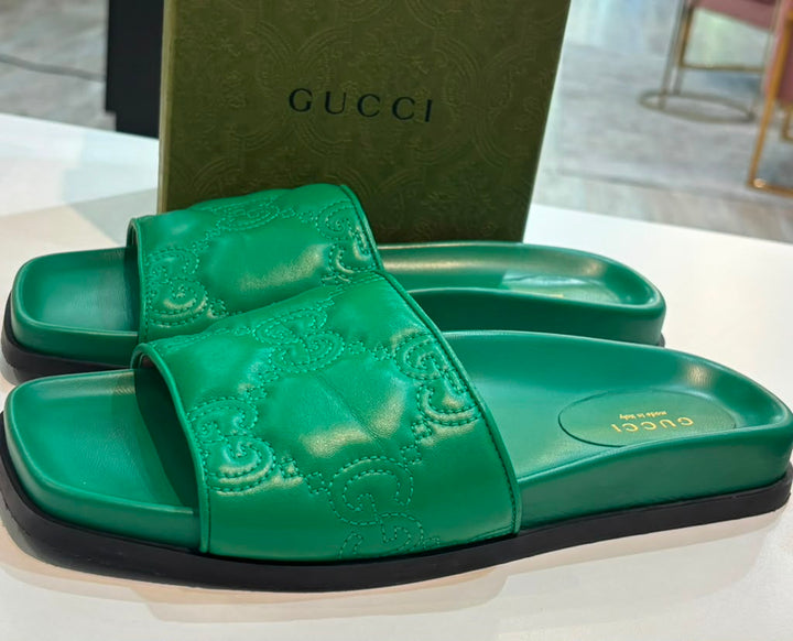 GUCCI GG MATELASSÉ LEATHER SLIDE MULES