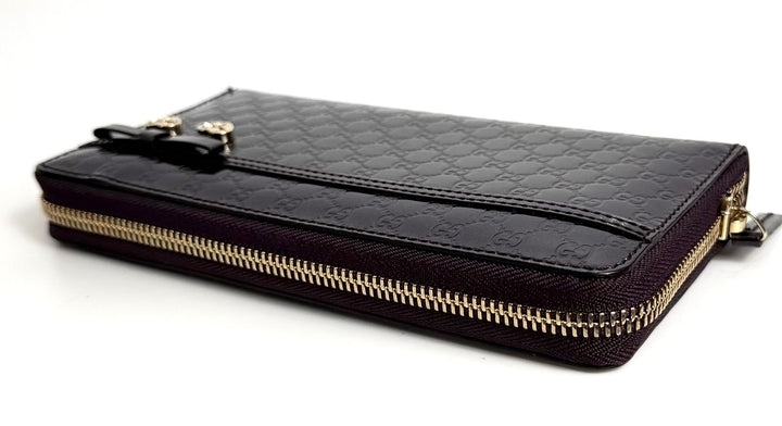 GUCCI SHINY MICROGUCCISSIMA ZIPPY HEART CHARM LEATHER WALLET