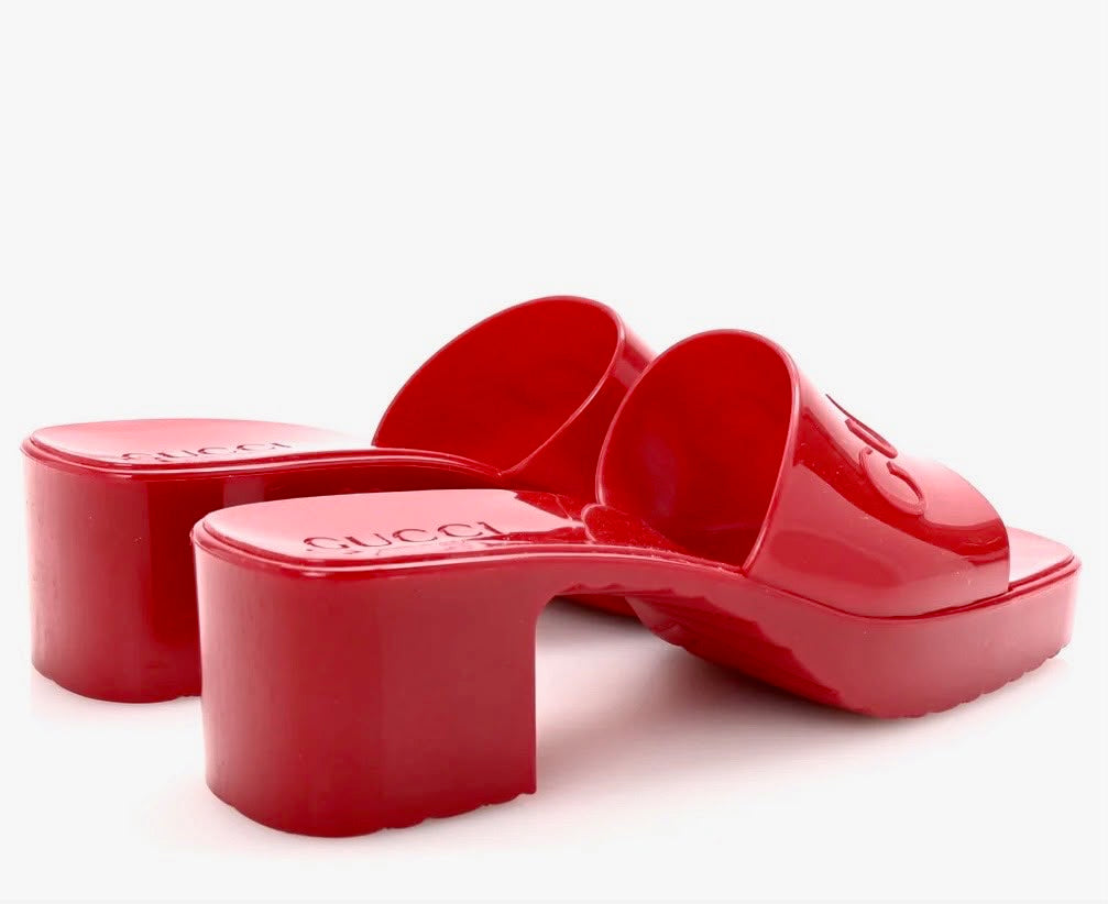 GUCCI EMBOSSED LOGO RUBBER PLATFORM MULES