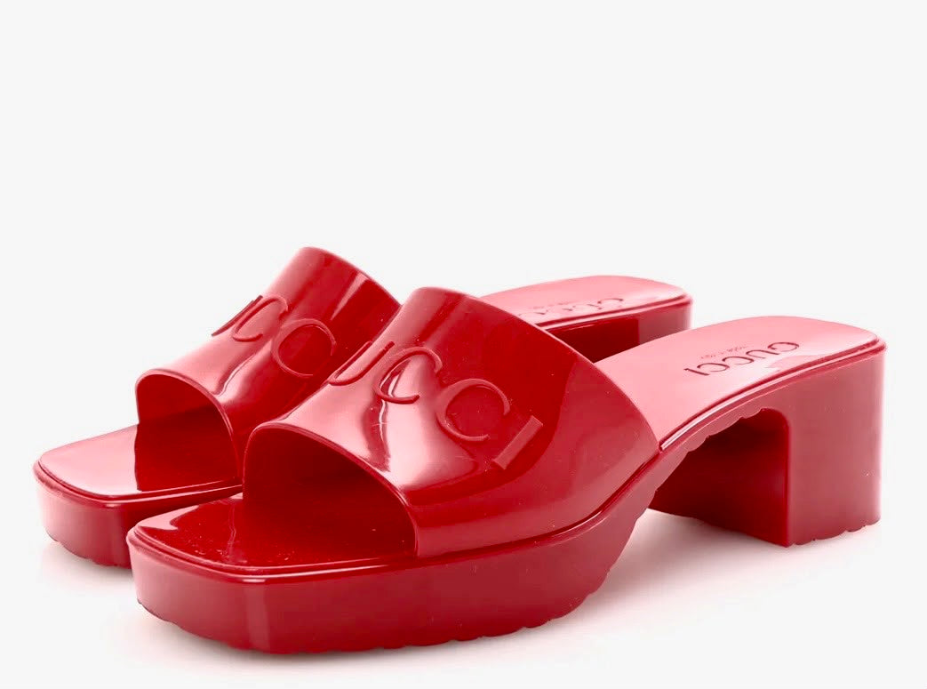GUCCI EMBOSSED LOGO RUBBER PLATFORM MULES