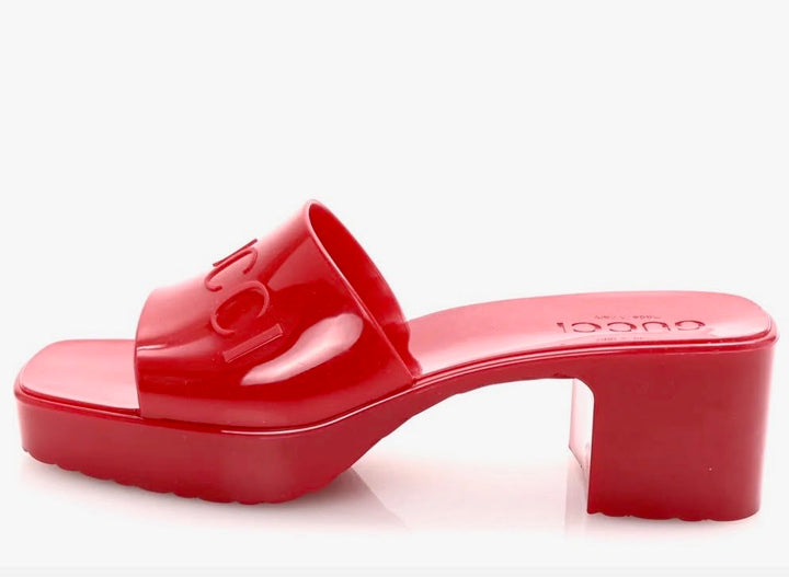 GUCCI EMBOSSED LOGO RUBBER PLATFORM MULES