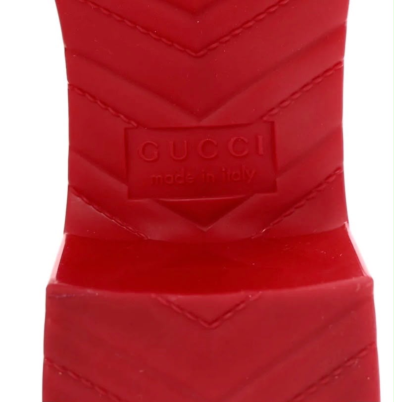 GUCCI EMBOSSED LOGO RUBBER PLATFORM MULES
