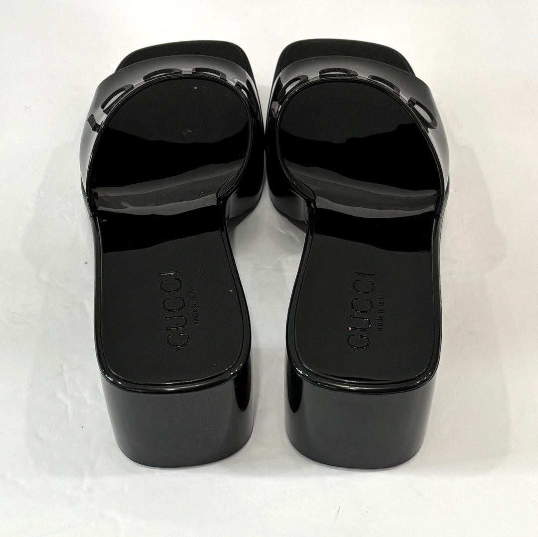 GUCCI EMBOSSED LOGO RUBBER PLATFORM SANDALS