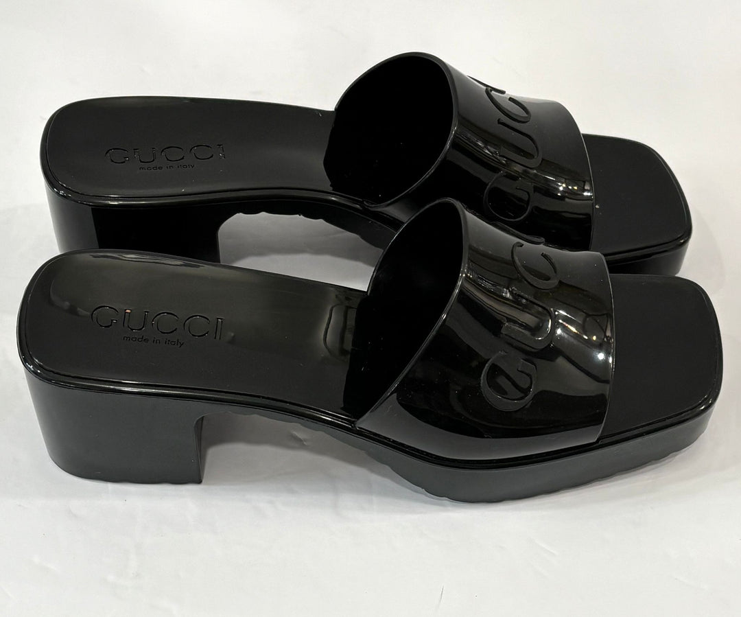 GUCCI EMBOSSED LOGO RUBBER PLATFORM SANDALS