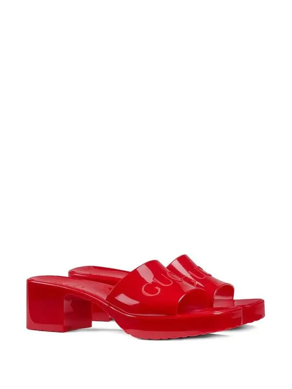 GUCCI EMBOSSED LOGO RUBBER PLATFORM MULES