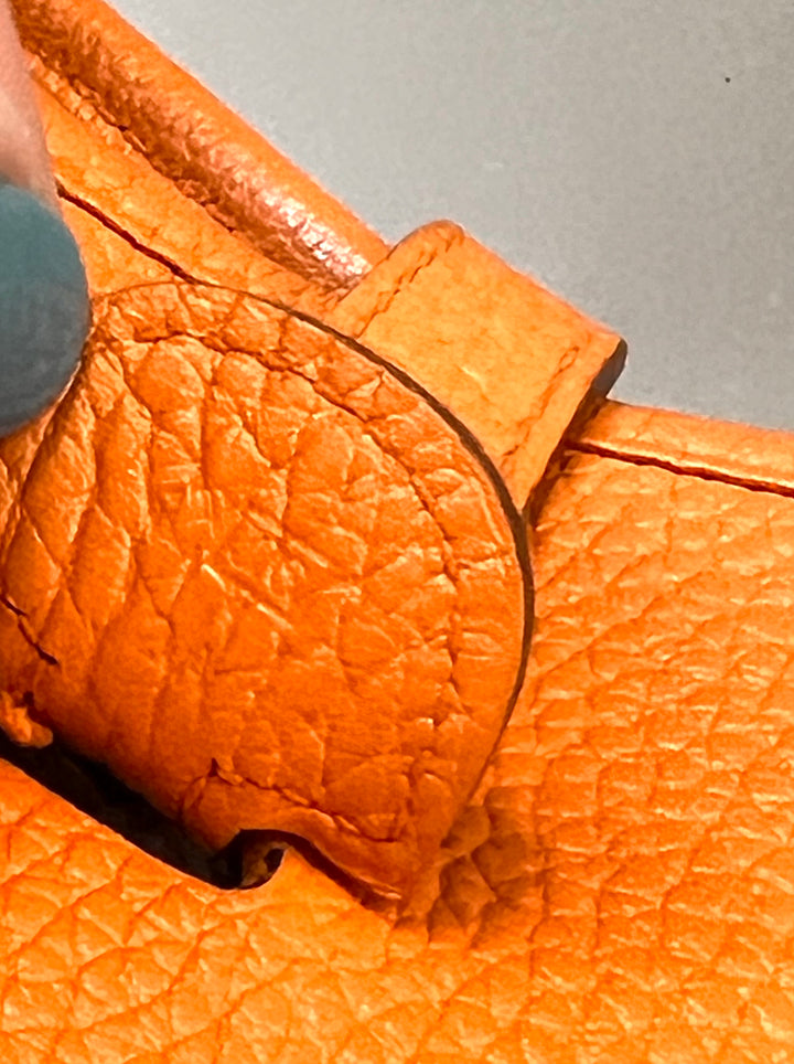 HERMÈS EVELYNE III PM CLEMENCE SHOULDER BAG IN ORANGE