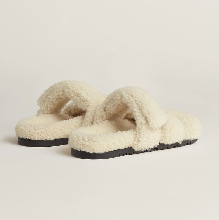 HERMÈS WOOLSKIN CHYPRE MULES SANDALS
