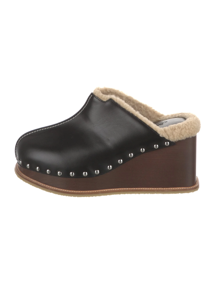 HERMÈS EARTH STUDDED SHEARLING WEDGE HEEL MULES