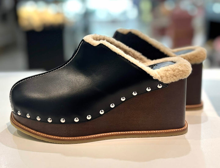 HERMÈS EARTH STUDDED SHEARLING WEDGE HEEL MULES