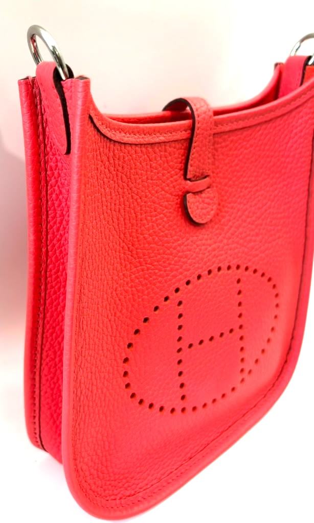HERMÈS MINI EVELYNE CLÉMENCE LEATHER CROSSBODY BAG IN ROUGE PIVOINE