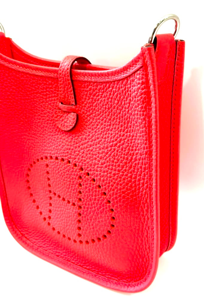 HERMÈS MINI EVELYNE CLÉMENCE LEATHER CROSSBODY BAG IN ROUGE PIVOINE