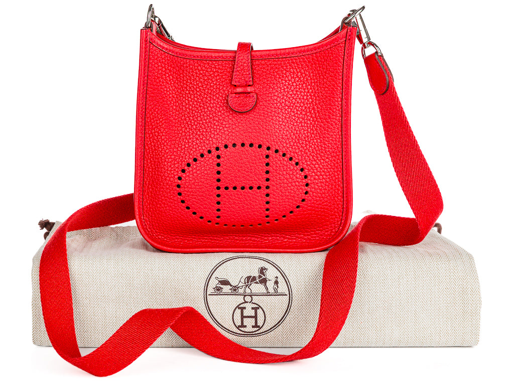 HERMÈS MINI EVELYNE CLÉMENCE LEATHER CROSSBODY BAG IN ROUGE PIVOINE