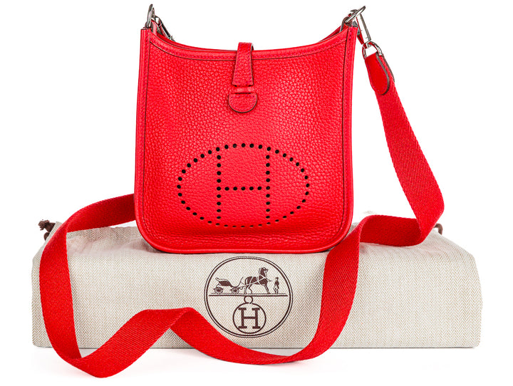 HERMÈS MINI EVELYNE CLÉMENCE LEATHER CROSSBODY BAG IN ROUGE PIVOINE