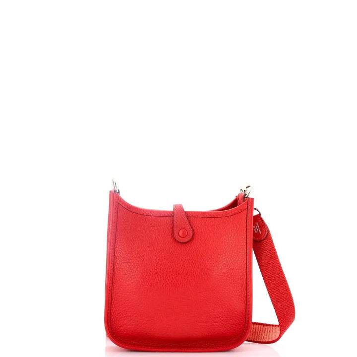 HERMÈS MINI EVELYNE CLÉMENCE LEATHER CROSSBODY BAG IN ROUGE PIVOINE