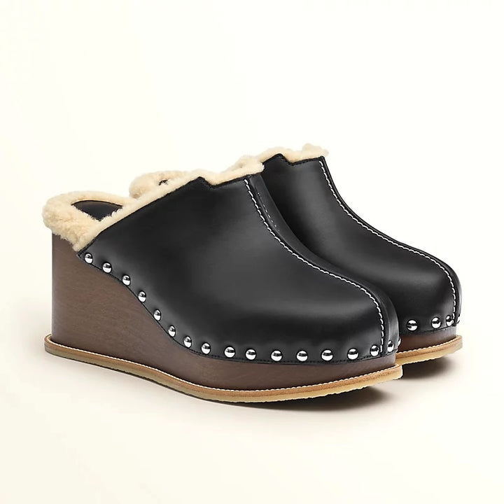 HERMÈS EARTH STUDDED SHEARLING WEDGE HEEL MULES