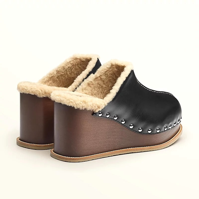 HERMÈS EARTH STUDDED SHEARLING WEDGE HEEL MULES