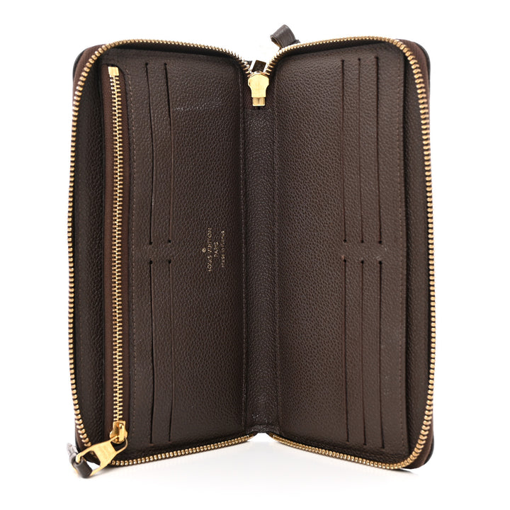 LOUIS VUITTON MONOGRAM EMPREINTE LEATHER SECRET ZIPPY WALLET
