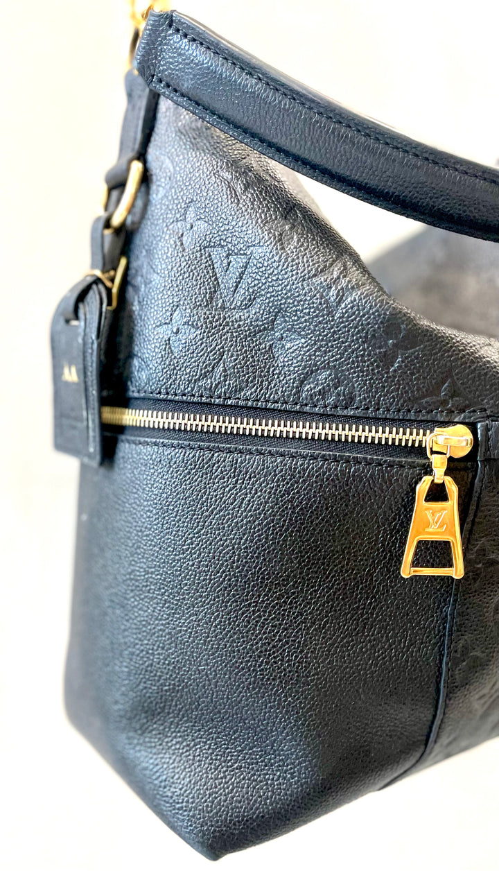 LOUIS VUITTON MONOGRAM EMPERIENTE MELIE HOBO BAG