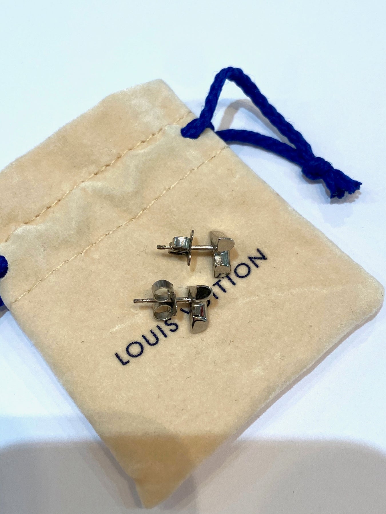 Louis Vuitton Essential V Stud Earrings  Rent Louis Vuitton jewelry for  $55/month