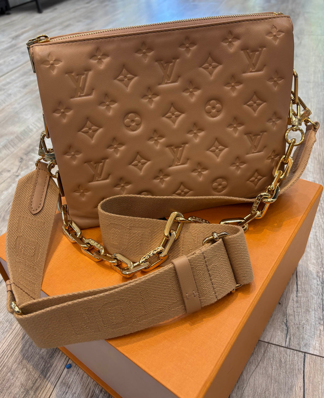 LOUIS VUITTON LAMBSKIN EMBOSSED MONOGRAM COUSSIN PM BAG