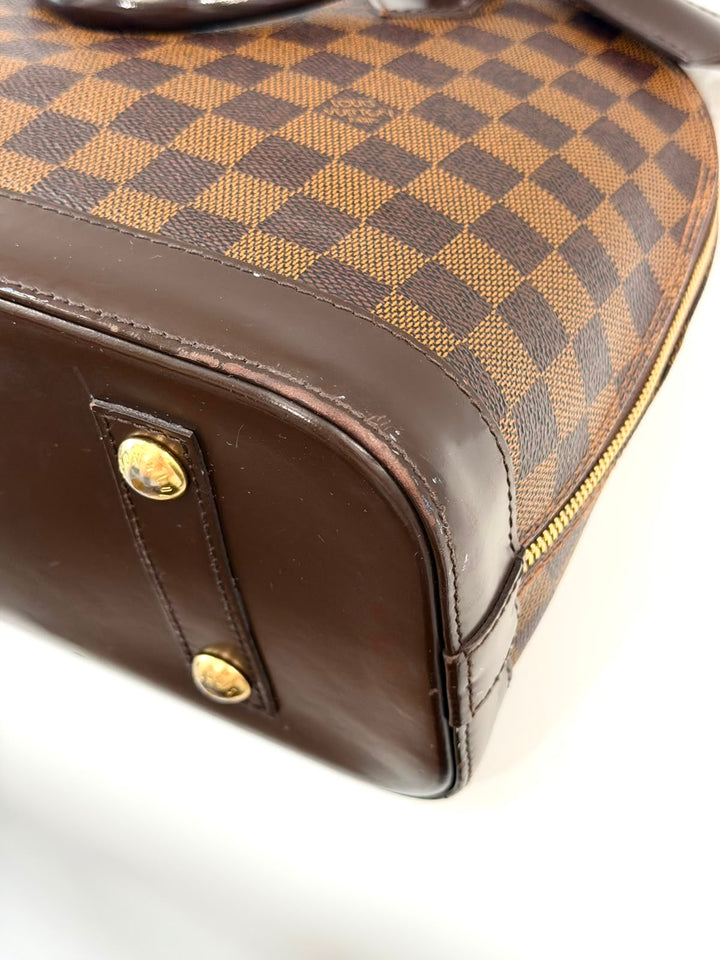 LOUIS VUITTON DAMIER EBENE ALMA PM HANDBAG