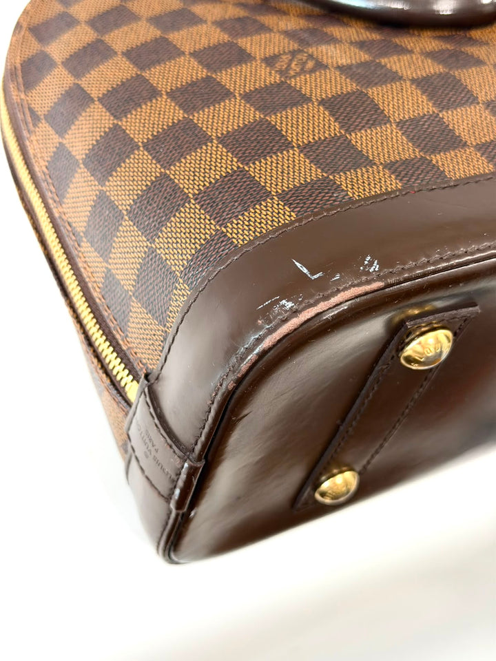 LOUIS VUITTON DAMIER EBENE ALMA PM HANDBAG